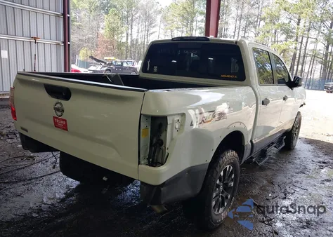 2018 Nissan Titan Pro-4X из США, поврежденный, VIN 1N6AA1E56JN523357